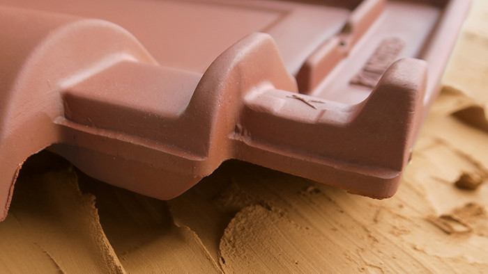 Clay roof tiles with raw clay